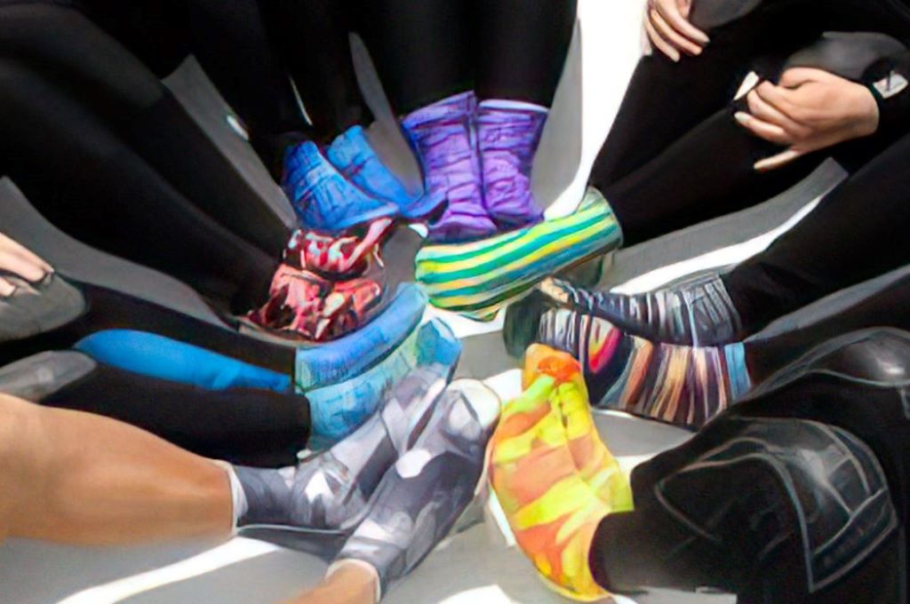 Different fin socks displayed for choosing the best option for surfing comfort
