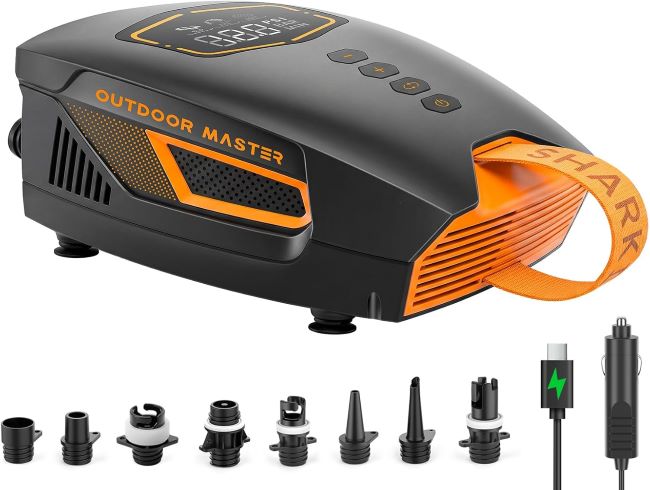 OutdoorMaster Shark 3 Mini electric SUP pump inflating a paddle board in Michigan