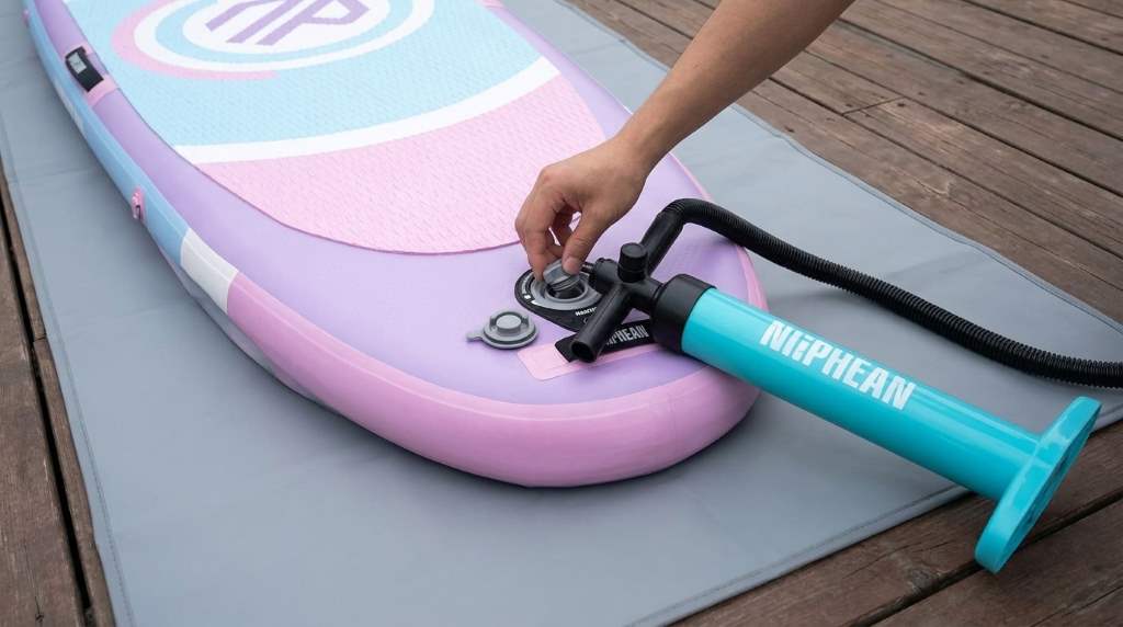 Rolling the Niphean Ultra Light Inflatable Paddle Board after deflating